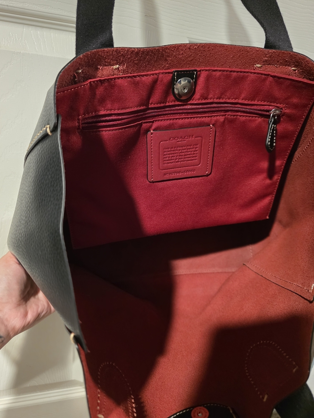Coach Derby Tote Bag in black pebbled leather with a contrasting red interior. - Picture 9 of 11